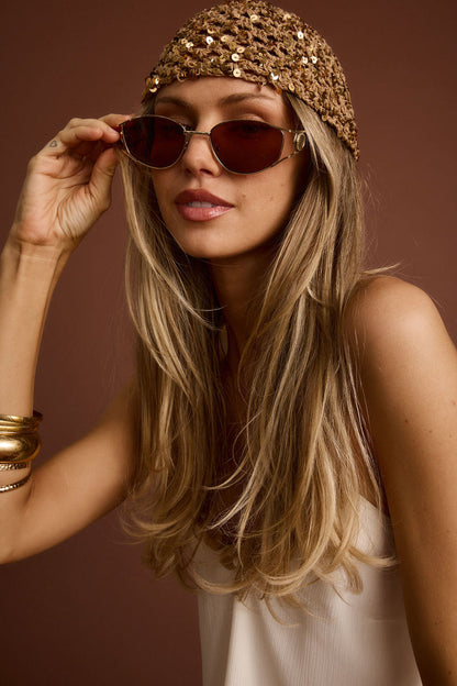 Detail shot of the Desert Soul Gold Rimmed Sunglasses highlighting the design elements.