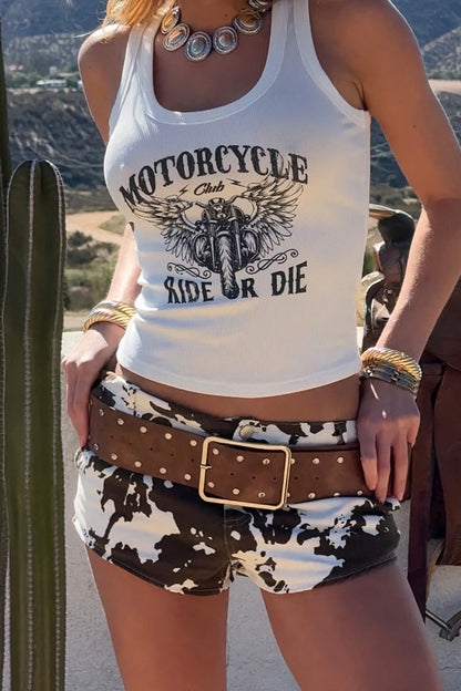 Product view of the Dixie Cow Print Low Rise Hot Shorts showcasing versatility and wearability.