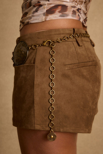 Dune Coin Statement Belt paired with complementary accessories for a polished look.