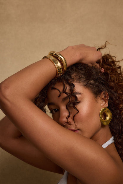 Elisa Gold Bangle Set styled in a complete look from an alternate angle.