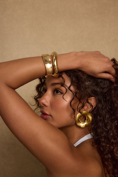 Elisa Gold Bangle Set paired with complementary accessories for a polished look.