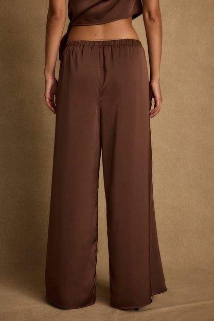 Estelle Espresso Satin Pant paired with complementary accessories for a polished look.