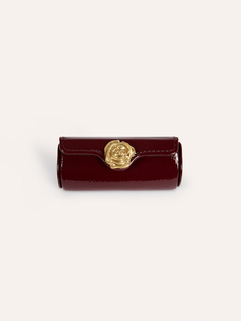 LIPS burgundy lipstick case with rose snap, front view by Rouje