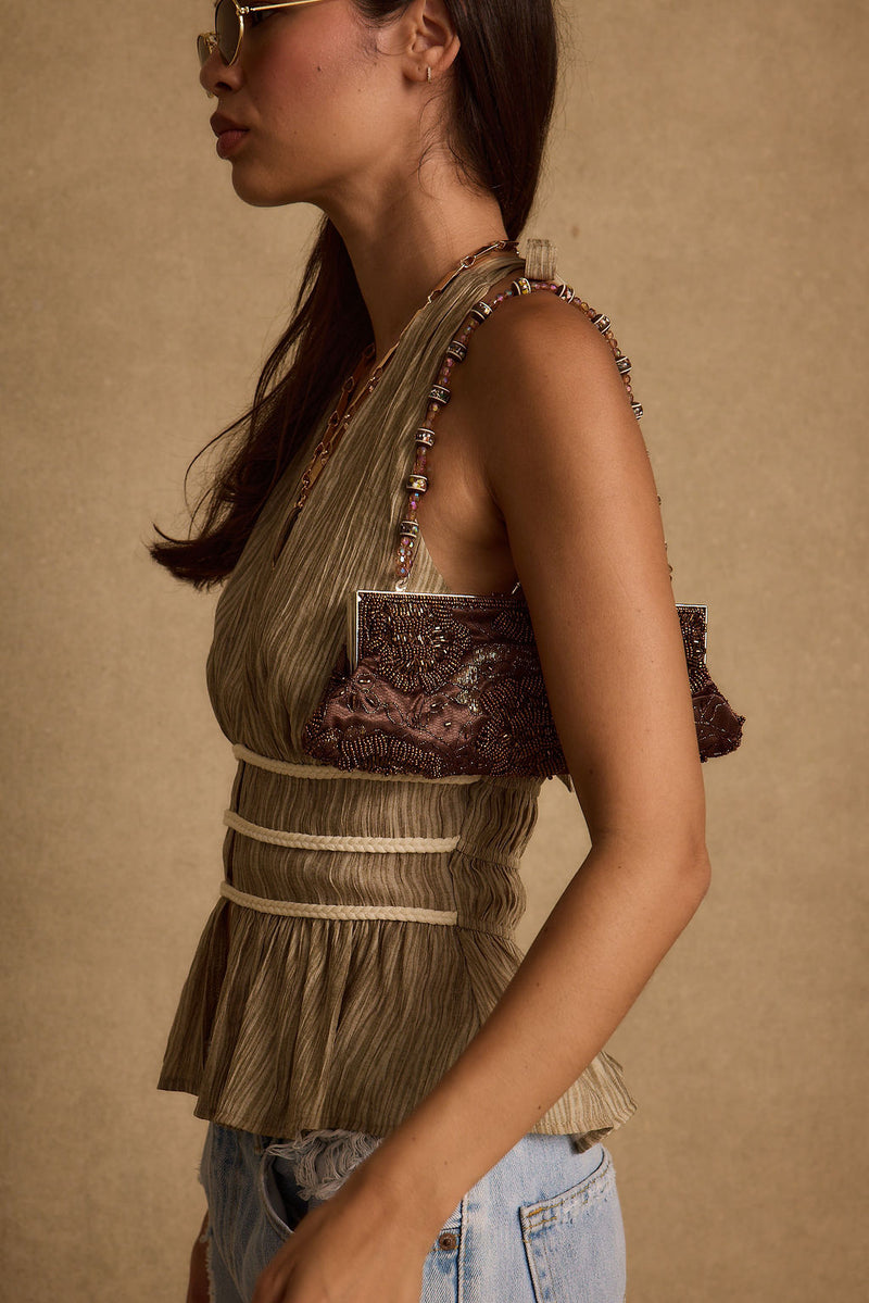 Franca Olive Striped Halter Top styled in a complete look from an alternate angle.