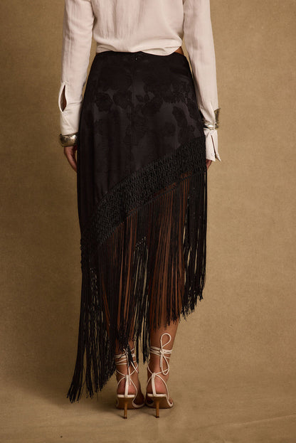 Close-up of the Frankie Black Satin Jacquard Fringe Midi Skirt showcasing the fringe texture and craftsmanship.