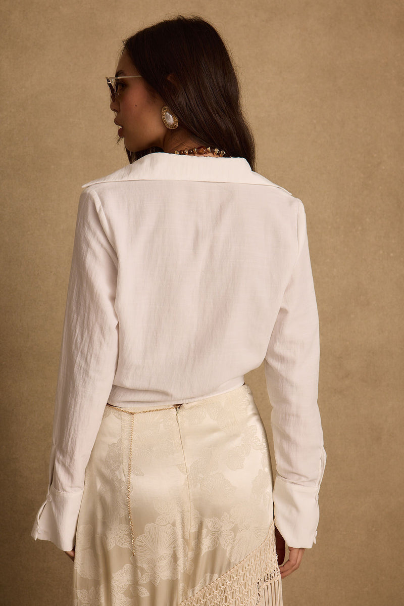Frankie Cream Satin Jacquard Fringe Midi Skirt paired with complementary accessories for a polished look.