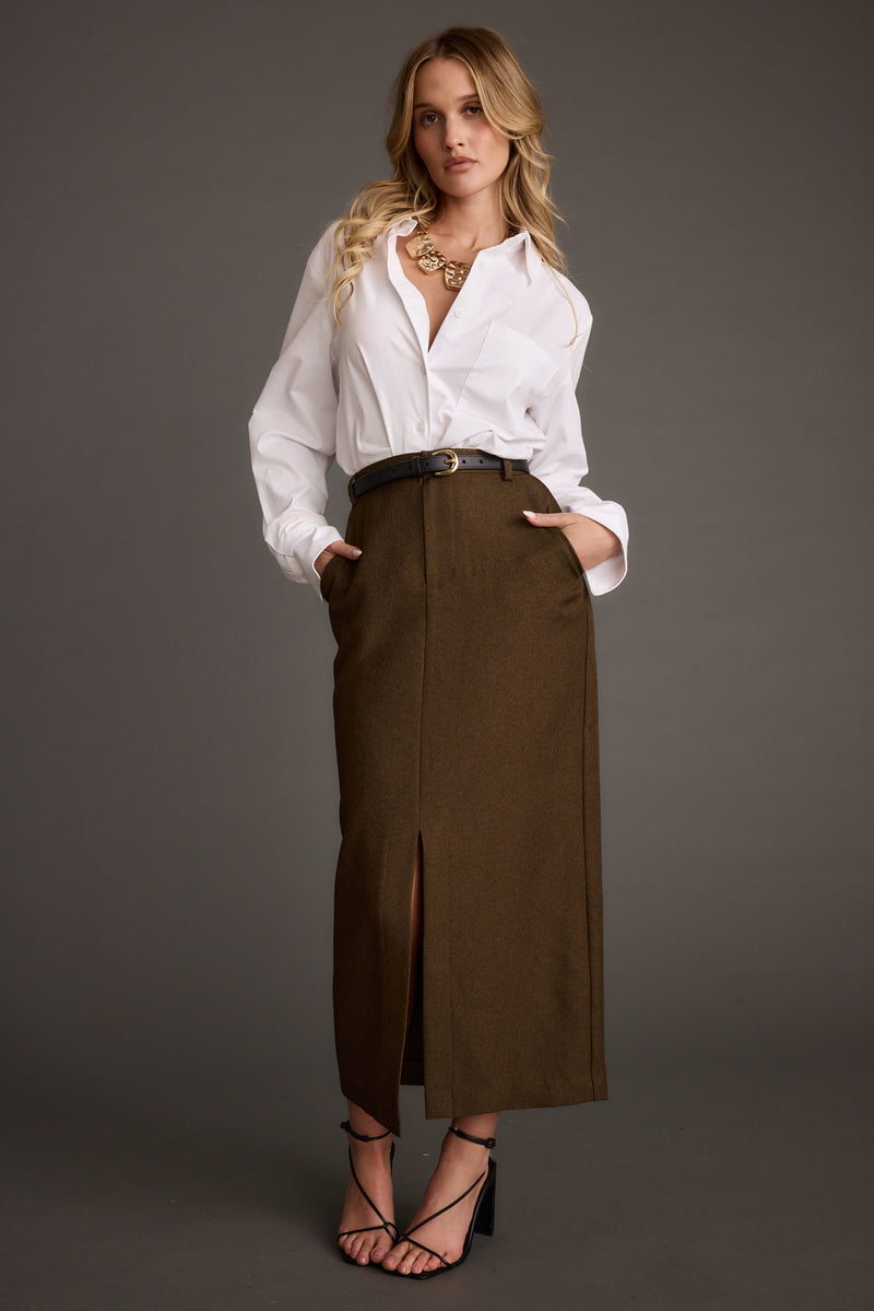 Lifestyle shot of the white piece styled for day-to-night versatility.