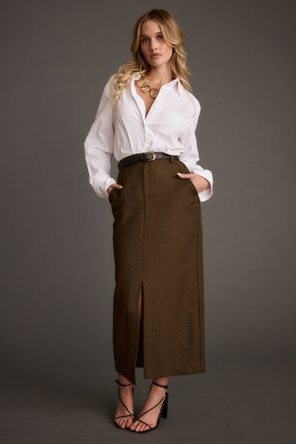 Lifestyle shot of the white piece styled for day-to-night versatility.