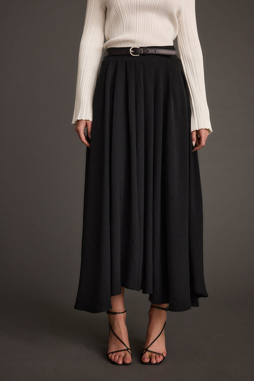 Black midi skirt with elegant accents, a black lace skirt essential.