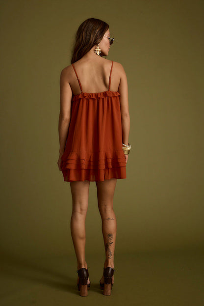 Golden Hour Rust Mini Dress paired with complementary accessories for a polished look.