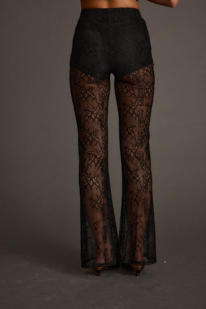 Happy Hour Black Lace Flare Pant styled in a complete look from an alternate angle.