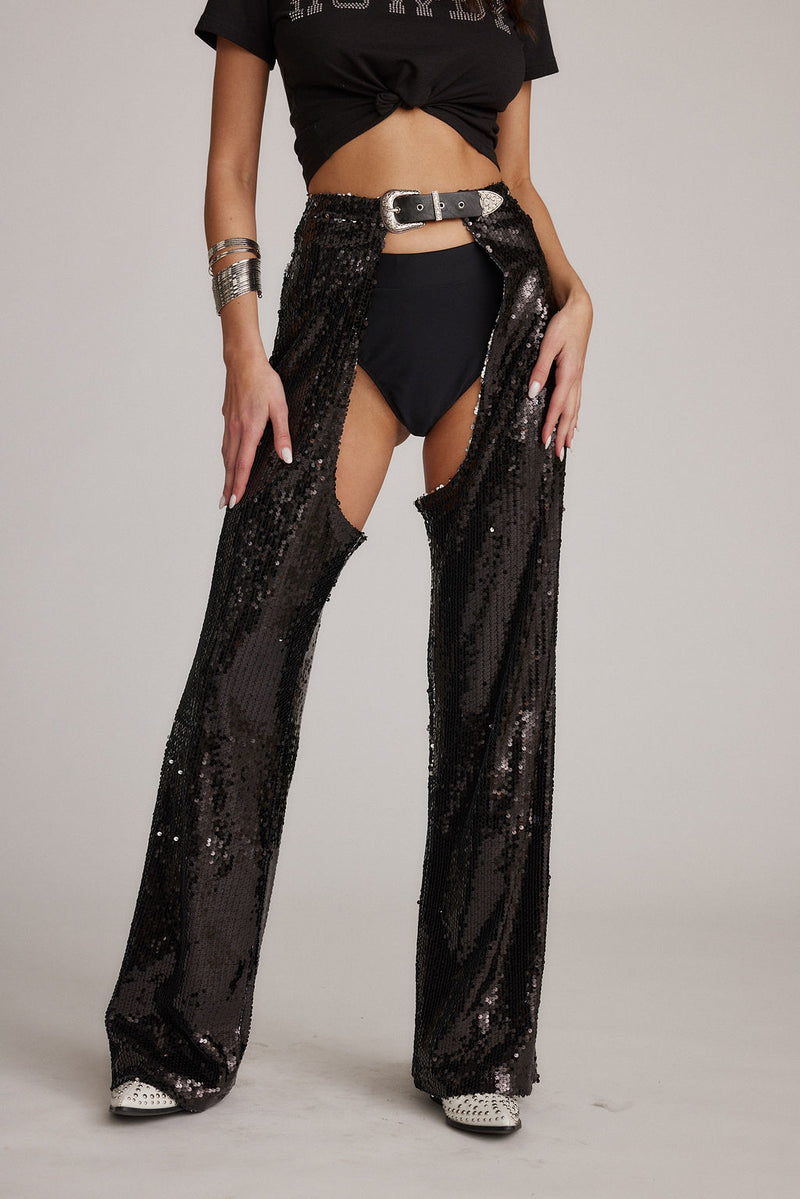 Black sequin pants with refined accents, a rhinestone chaps standout.