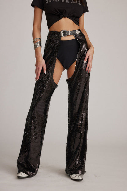 Black sequin pants with refined accents, a rhinestone chaps standout.