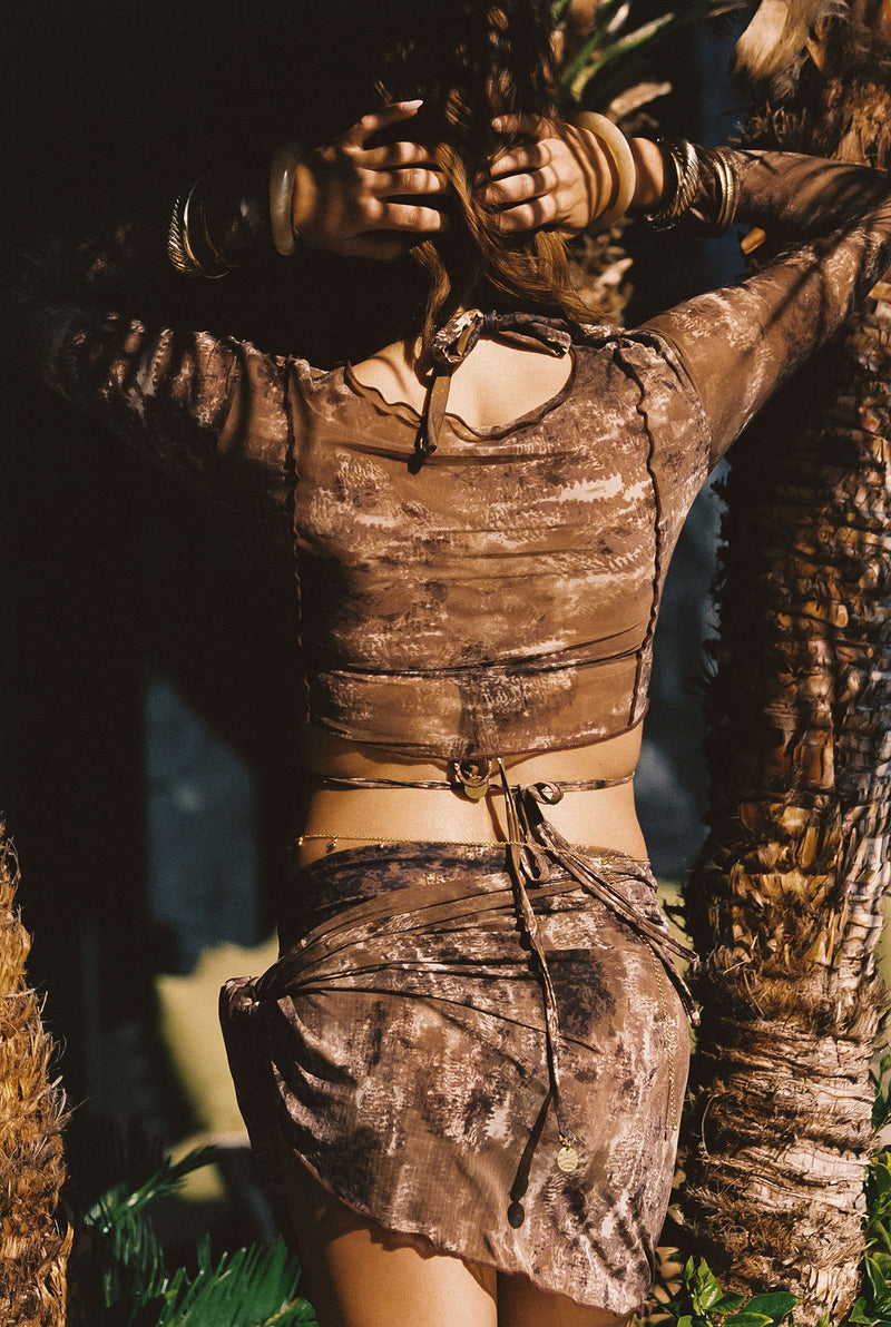 Full-length view of the mocha top showing the drape and movement.