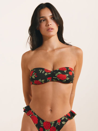 SADE red roses print bandeau bikini top worn on a model by Rouje x Etam