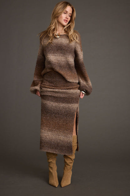 Brown ombre balloon sleeve sweater styled with a matching knit maxi skirt and suede boots.
