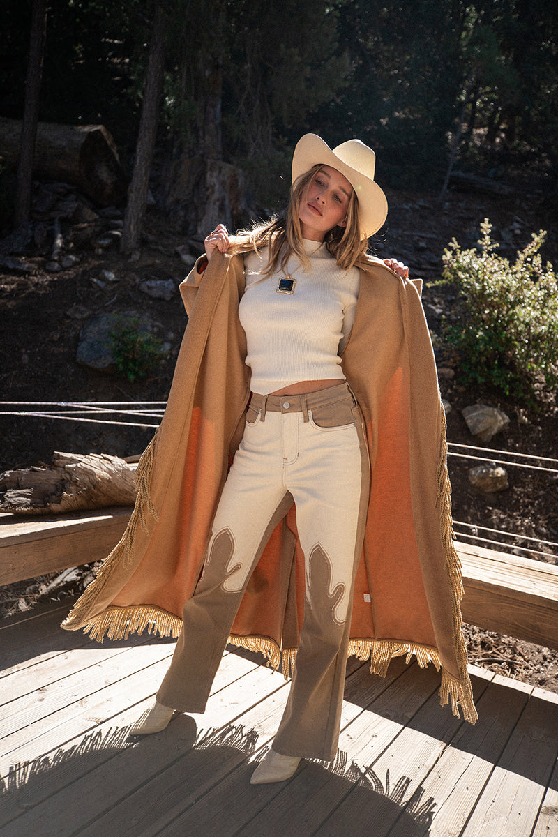 Full-length view of the pants showing the drape and movement.