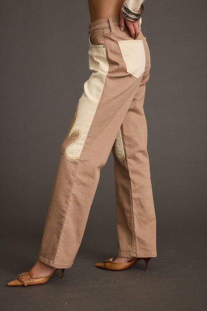 Lifestyle shot of the pants styled for day-to-night versatility.