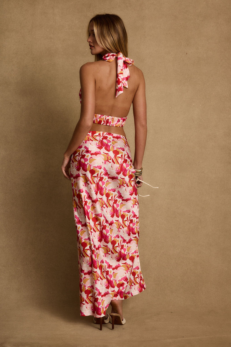 Joelle Pink Floral Halter Crop Top paired with complementary accessories for a polished look.