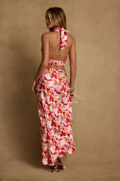 Joelle Pink Floral Halter Crop Top paired with complementary accessories for a polished look.