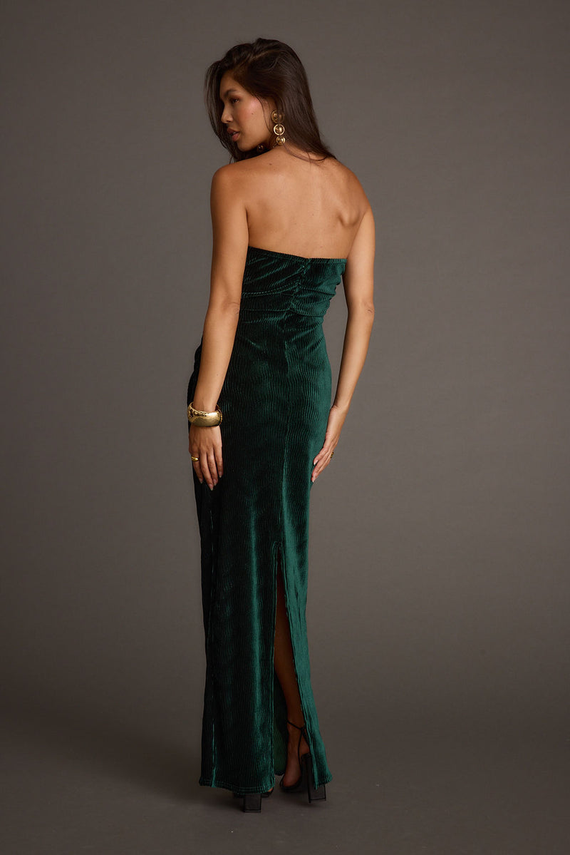 Close-up of the Jones Emerald Velvet Maxi Dress showcasing the velvet texture and craftsmanship.