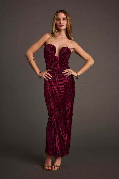 Maxi dress with elegant accents, a vacation maxi dress essential.