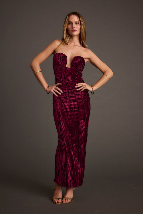 Maxi dress with elegant accents, a vacation maxi dress essential.