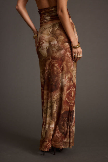 Lifestyle shot of the floral maxi skirt styled for day-to-night versatility.