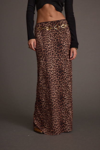Leopard print maxi skirt with refined detailing and a flattering silhouette.