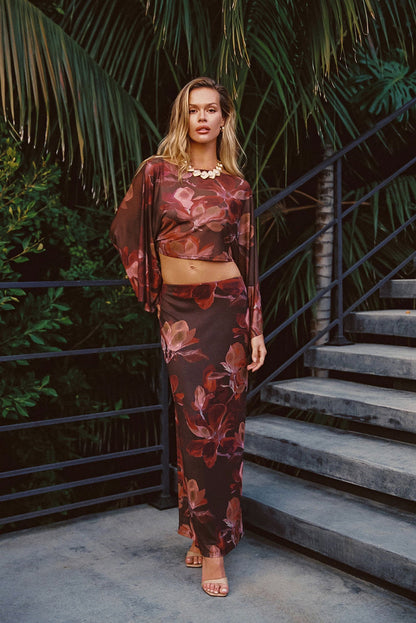 Back view of the floral mesh maxi skirt showing the silhouette and fit.