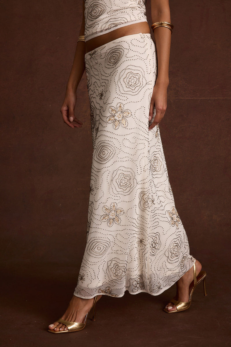 Close-up of the Julia White Beaded Maxi Skirt showcasing the beaded texture and craftsmanship.