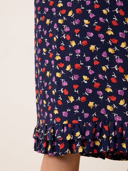 ELIETTE navy tulip print flowing crepe midi skirt, side view by Rouje