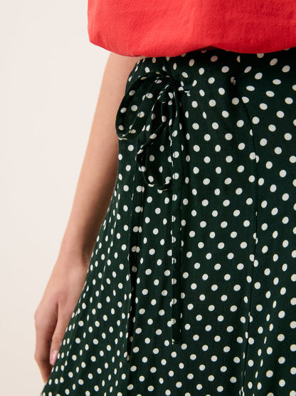 ILONA green polka-dot fluid jersey midi skirt, lifestyle setting by Rouje