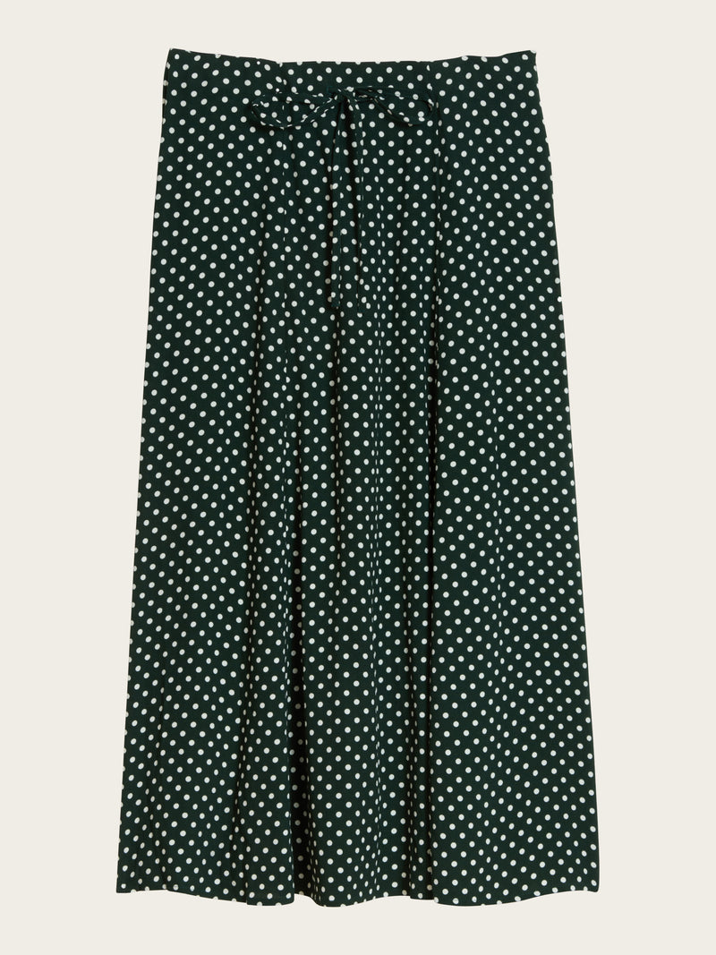packshot of Ilona midi skirt in green polka dots