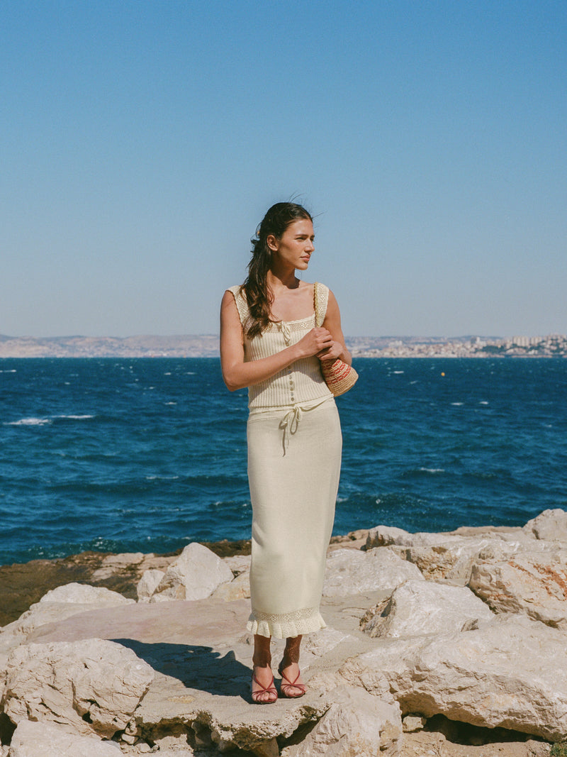 Lester ecru maxi knit and crochet skirt worn by a model, lifestyle setting