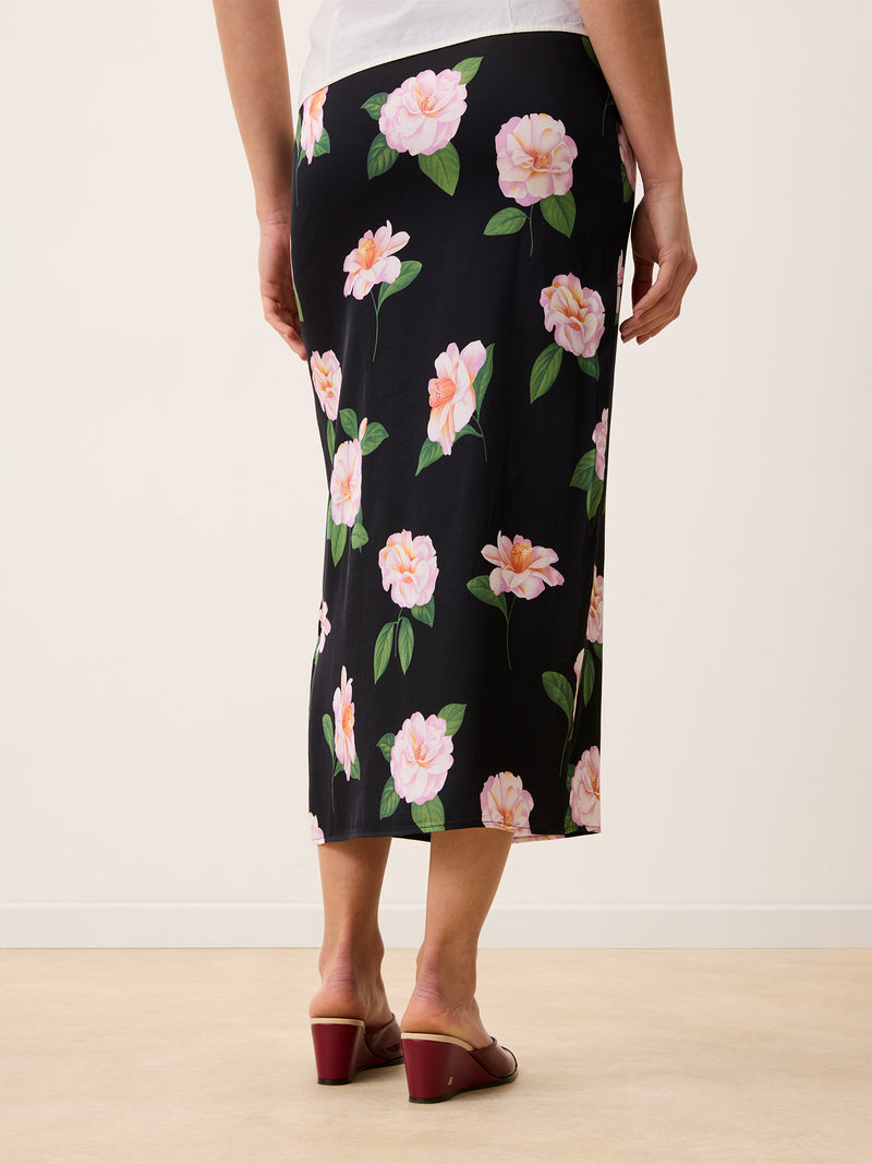 NAELLA black Fleurs de Minuit floral stretch satin midi tube skirt, front view by Rouje