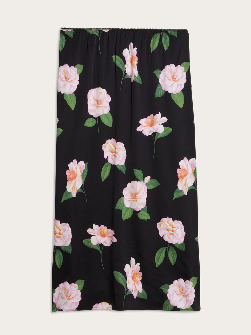 NAELLA black Fleurs de Minuit stretch satin midi skirt, side view by Rouje
