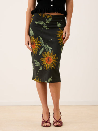 NINOU black Soleil de midi sunflower print cotton midi tube skirt, front view by Rouje