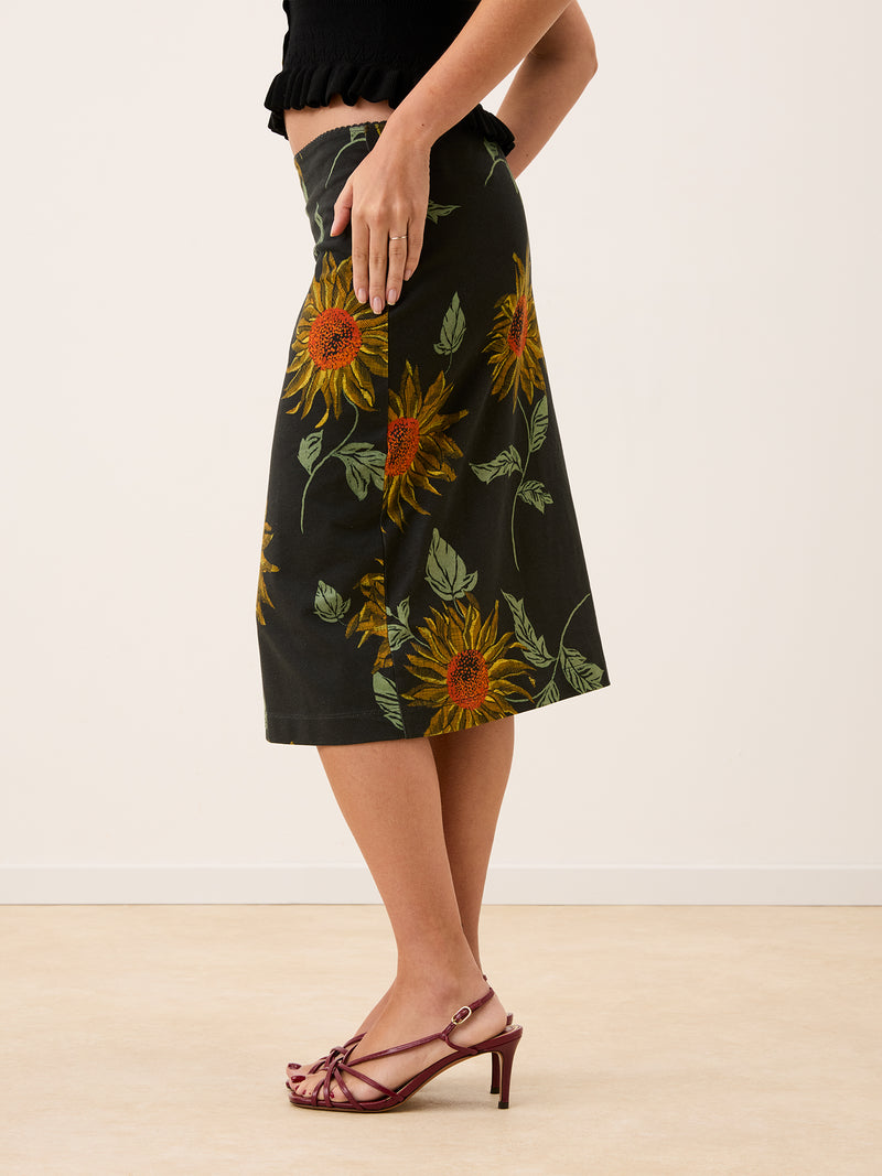 NINOU black sunflower print cotton midi skirt, back view by Rouje