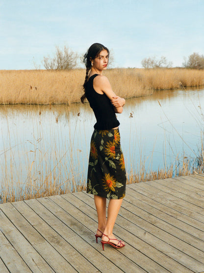 NINOU black sunflower print cotton midi tube skirt, lifestyle setting by Rouje