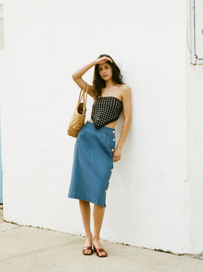 SHERYL denim blue midi skirt worn on a model by Rouje