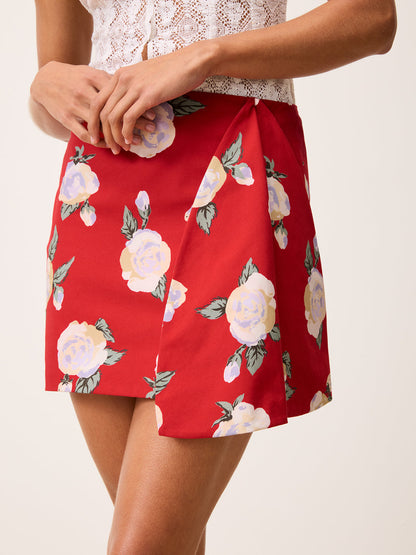 VOLVER Rose Drama red floral print short skirt, front view by Rouje