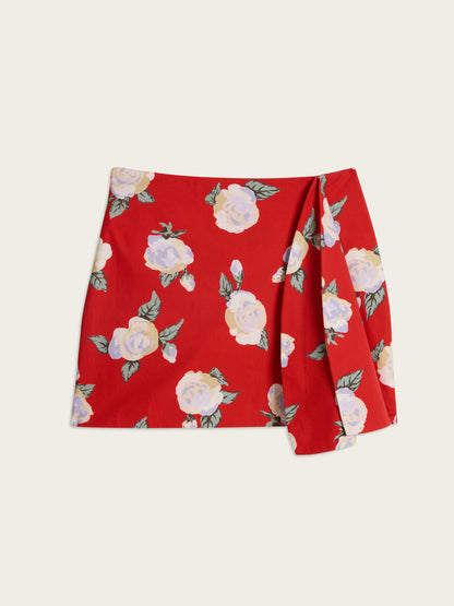 VOLVER Rose Drama red floral print short skirt, flat packshot by Rouje