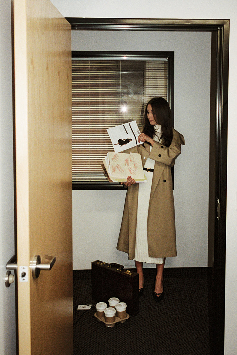 Ruth Cream Turtleneck Sleeveless Sweater Midi Dress styled in a complete look from an alternate angle.