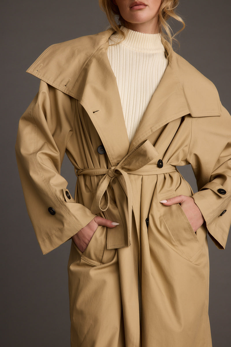 Lifestyle shot of the khaki jacket styled for day-to-night versatility.