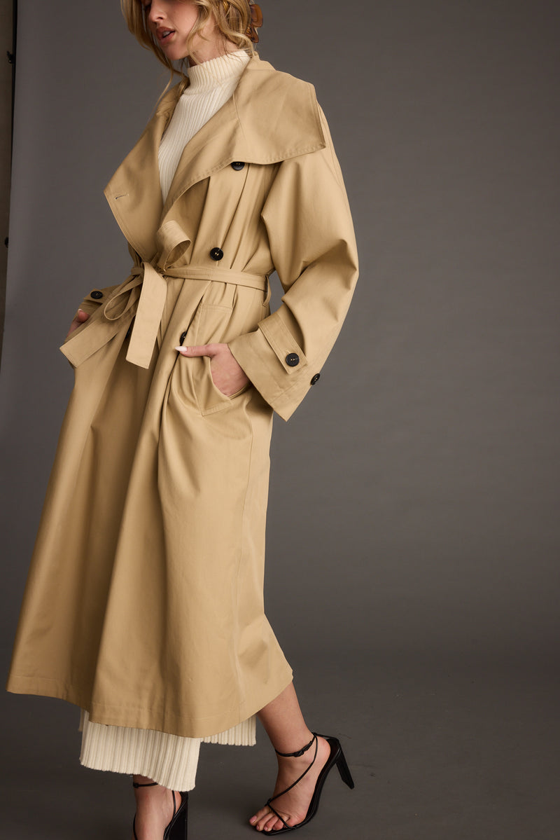 Close-up of the Moss Khaki Classic Trench Coat showcasing the fabric texture and design details.