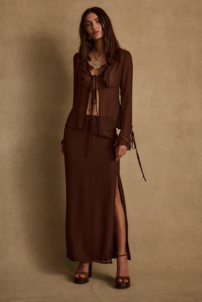 Back view of the mocha maxi skirt showing the silhouette and fit.