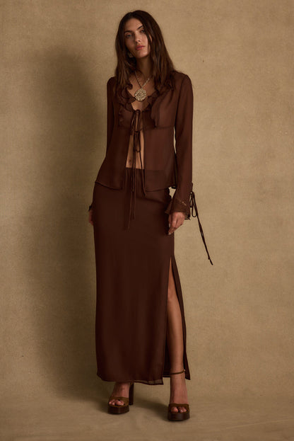 Back view of the mocha maxi skirt showing the silhouette and fit.