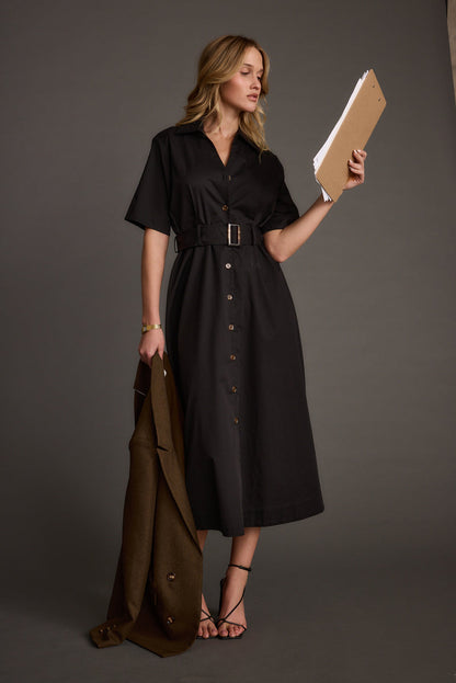 Close-up of the Leena Black Button Front Belted Midi Dress showcasing the fabric texture and design details.