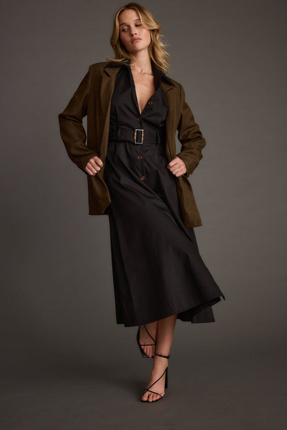 Detail shot of the Leena Black Button Front Belted Midi Dress highlighting the design elements.